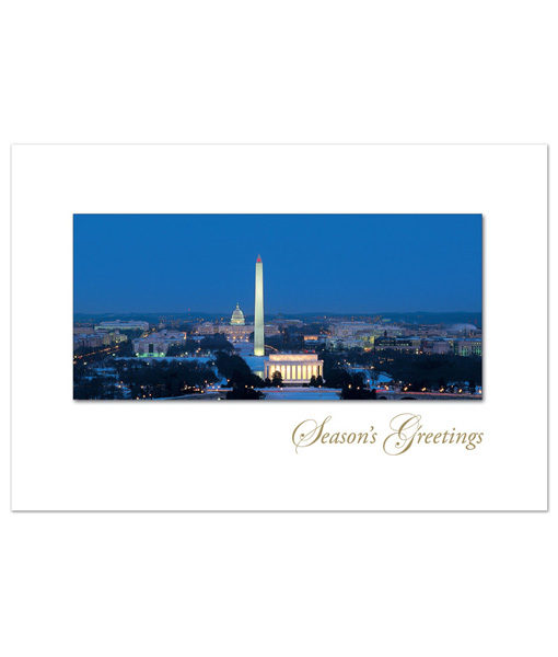 Washington DC Skyline holiday card. The classic view of the Washington skyline and its monuments on a snowy night.